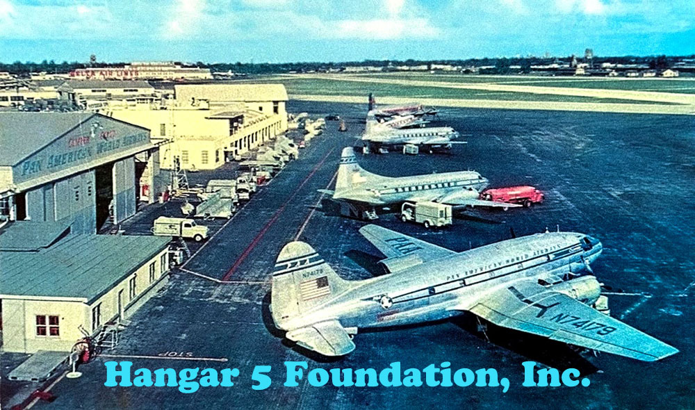 A historical view of the Pan American hangar with vintage aircraft parked at the Miami airport, showcasing the rich history of aviation in Florida.