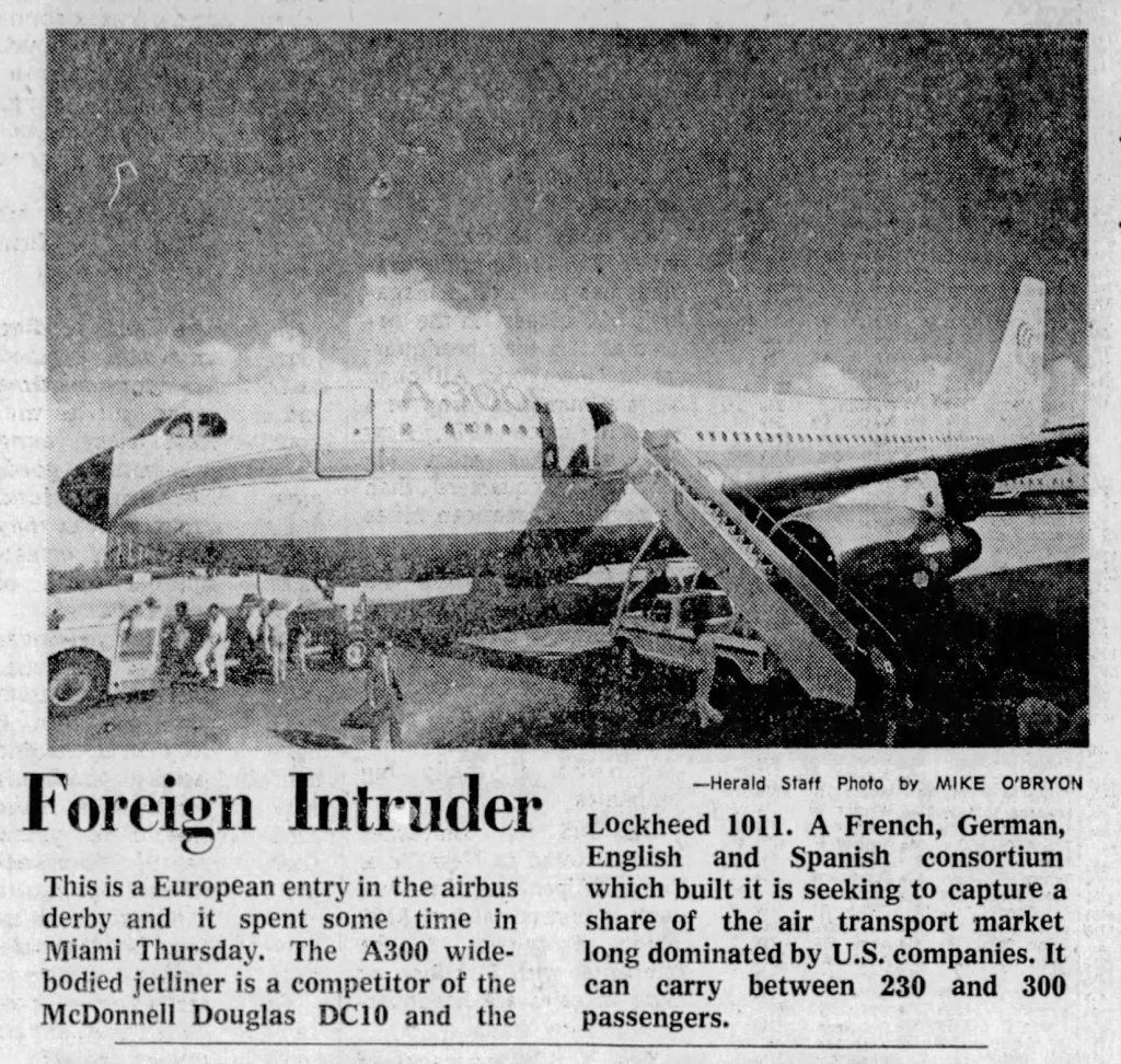 A327A330 wide-bodied jetliner at Miami airport with a boarding staircase and passengers approaching the aircraft. The image includes a caption discussing its competition with McDonnell Douglas DC10 and Lockheed 1011.